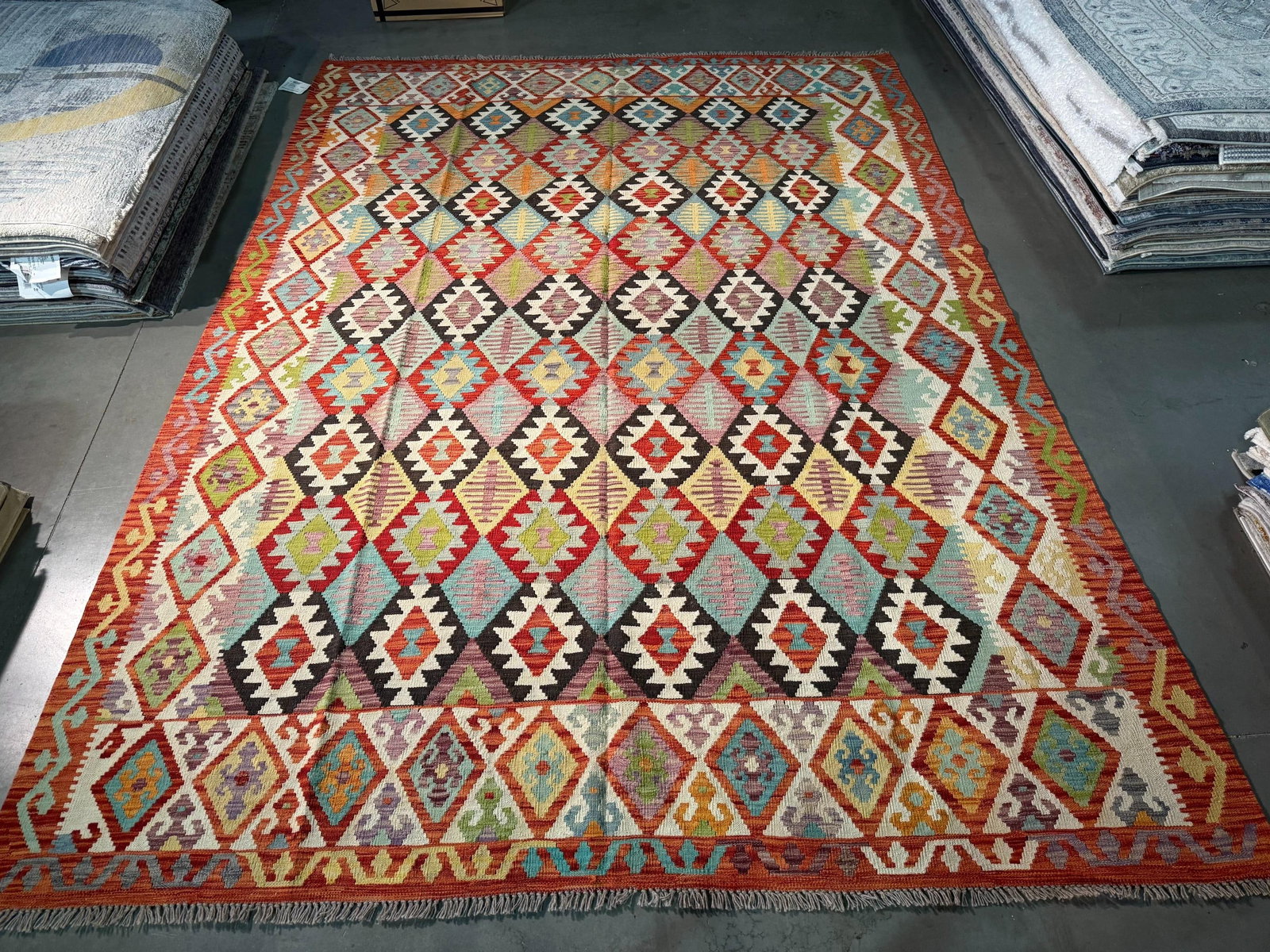 Colorful Klim Rug 8.4x11.5: Title:Colorful Klim Rug 8.4x11.5 Description:8'.4"X 11'.5" Colorful 100% wool reversible Klim rug in multi pastel colors Hand Knotted in Pakistan Reserve: $780.00 Shipping: Domestic: Flat-rate of