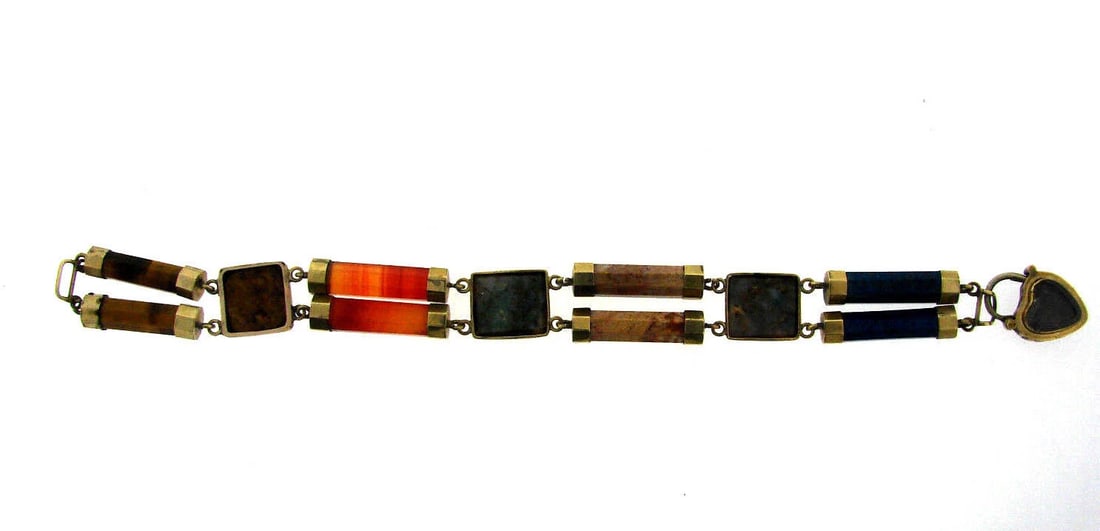 SCOTTISH 14K GOLD SILVER NATURAL STONE STRAND BRACELET LOCKER CHARM: Title: SCOTTISH 14K GOLD SILVER NATURAL STONE STRAND BRACELET LOCKER CHARM Description: N-GOO VICTORIAN C.1900 SCOTTISH COLOR STONES BRACELET WEIGHT 28.9 G LENGTH 7'' WIDTH 9/16'' HEART LOCK 7/8'' X