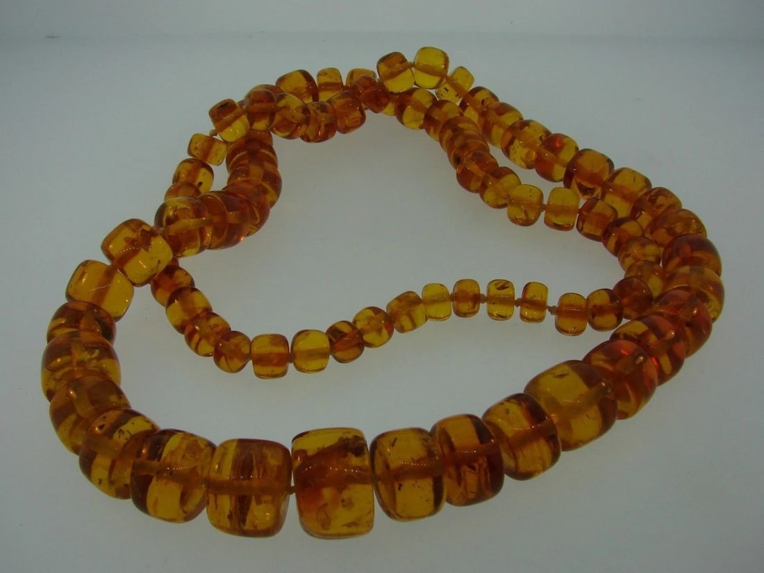 STUNNING Baltic Amber Beaded Necklace: Title: STUNNING Baltic Amber Beaded Necklace Description: DK Gorgeous Amber Beads · Wonderful beaded necklace that is a necessity in your collection. · The weight is 81.8 grams. · The l