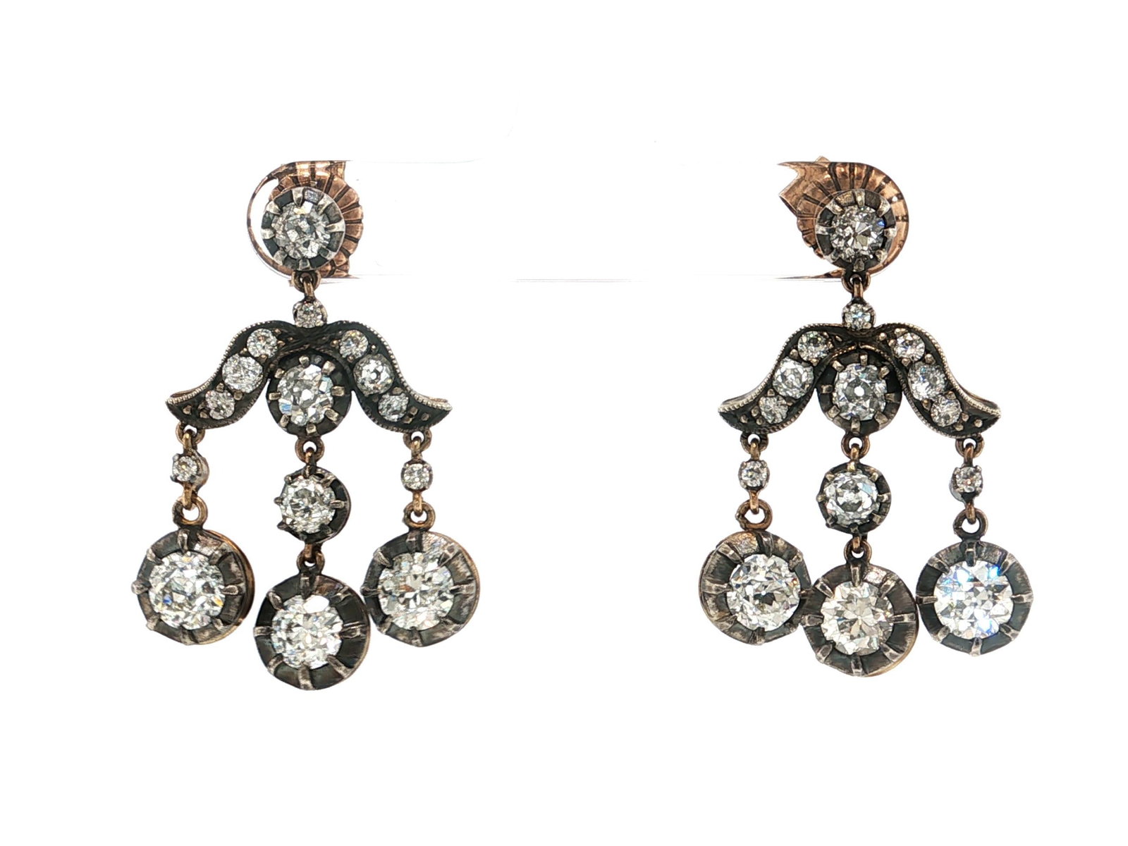 18K Gold and Silver Old Mine Cut Diamond Chandelier Dangle Earrings: Title: 18K Gold and Silver Old Mine Cut Diamond Chandelier Dangle Earrings Description: These antique-style chandelier earrings feature 6 old European cut diamonds of H color and VS1 clarity that