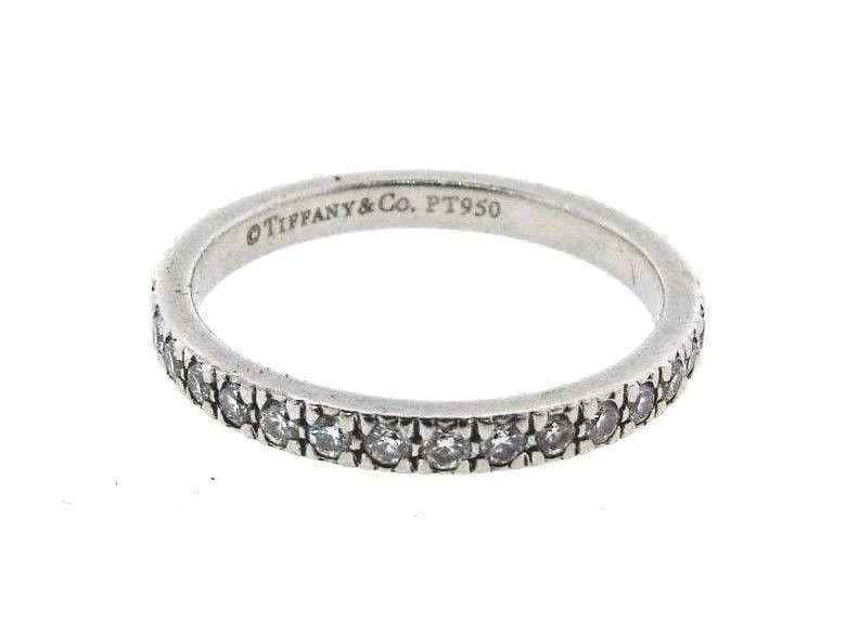 GORGEOUS Tiffany & Co. Platinum & Diamond Band: Title: GORGEOUS Tiffany & Co. Platinum & Diamond Band Description: DK Tiffany & Co. Platinum & Diamond Band · Wonderful band that is a necessity in your collection. · The weight is 3 grams.