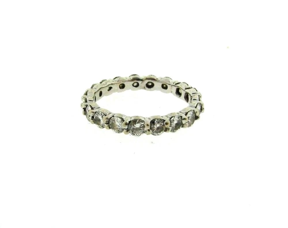 14K WHITE GOLD DIAMOND ETERNITY BAND RING: Title: 14K WHITE GOLD DIAMOND ETERNITY BAND RING Description: N-JOOO 14K WHITE GOLD DIAMOND ETERNITY BAND RING SIZE: 6.25 WEIGHT 2.4 G WIDTH UP TO 1/8'' DIAMONDS ARE APPROX. 1.88 CTS