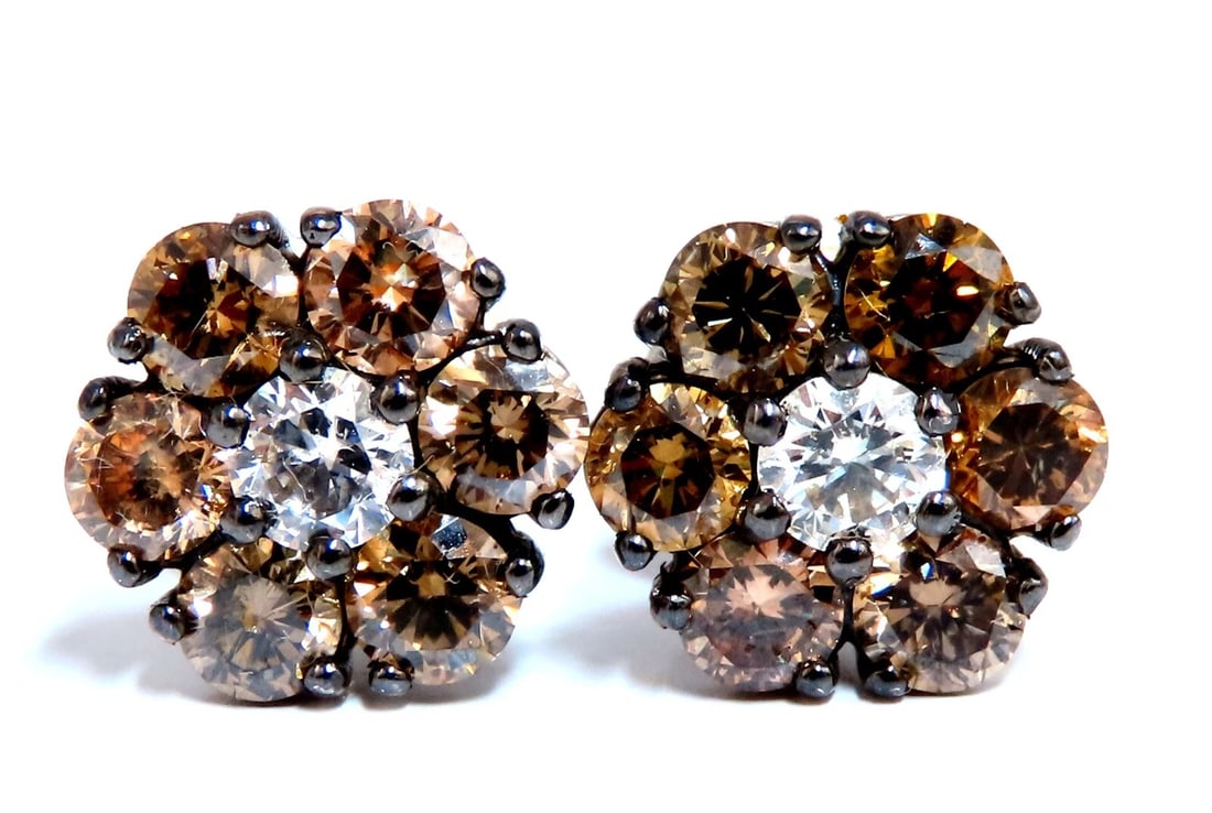 2.71ct. natural round diamond cluster earrings 14 karat Fancy Browns**: Title: 2.71ct. natural round diamond cluster earrings 14 karat Fancy Browns** Description: Cluster diamond earrings. Natural round diamonds .38ct center (2) diamonds. G-color Vs-2 clarity 2.33ct side 