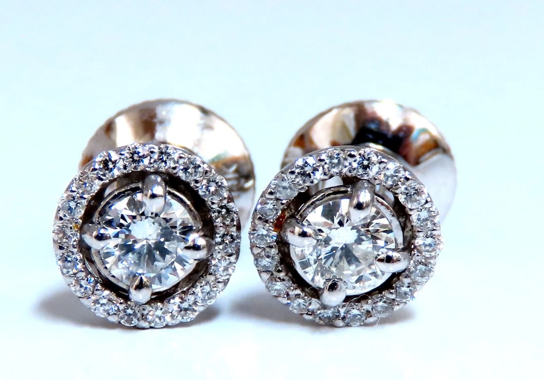 1.11ct. natural round diamond cluster earrings 14 karat**: Title: 1.11ct. natural round diamond cluster earrings 14 karat** Description: Cluster diamond earrings. Natural round diamonds .40ct center (2) diamonds. .71ct side diamond accents. G - color vs2 clar