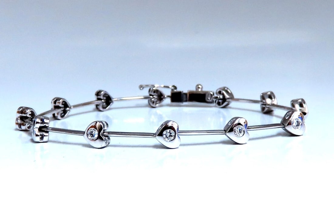 .80ct Natural Diamonds Heart Link Bracelet 14kt gold **: Title: .80ct Natural Diamonds Heart Link Bracelet 14kt gold ** Description: Heart & Bar Link .80ct. Natural diamonds bracelet. Round, full cuts G H color / Vs2 Si-1clarity. 18kt. white gold 9.7 Grams.