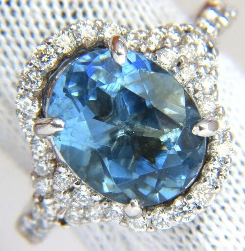 5.15ct natural prime aqua blue aquamarine diamonds ring 14kt **: Title: 5.15ct natural prime aqua blue aquamarine diamonds ring 14kt ** Description: 3.65ct. Natural Aquamarine ring. Oval cut, clean clarity & Transparent. 11 X 9.1mm 1.50ct Side round diamonds G-colo