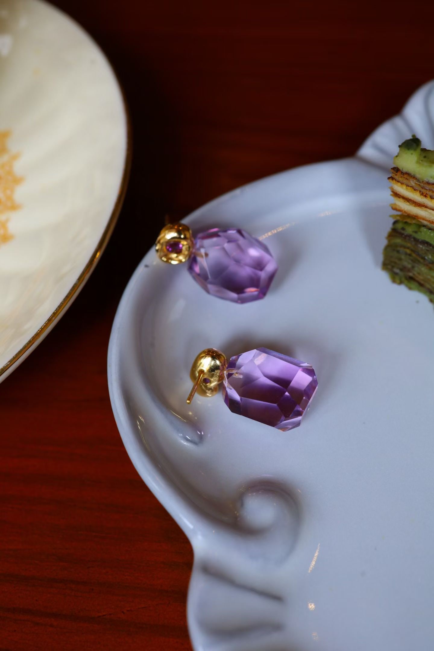 Sterling Silver Amethyst Earrings: Title: Sterling Silver Amethyst Earrings Description: Handcrafted with the original crystal shape of amethyst, each piece is unique. Simple design highlights the true essence of the material. Reserve: