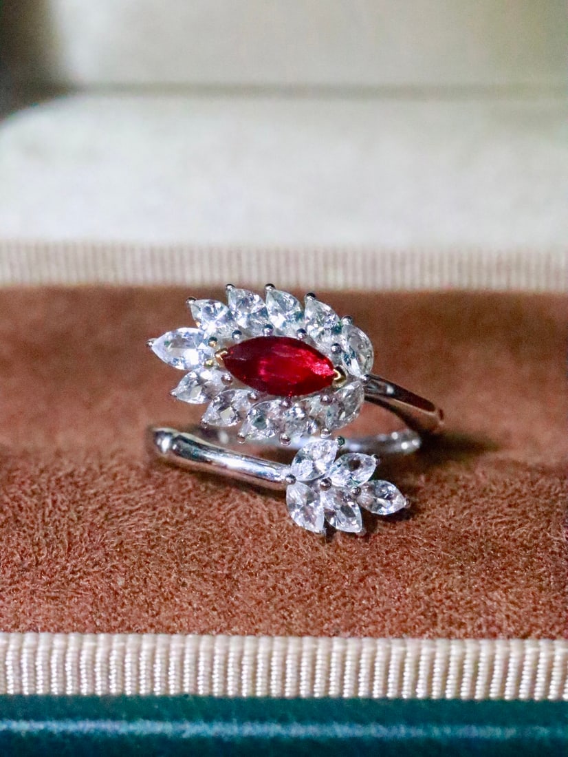 18K Gold Ruby Ring: Title: 18K Gold Ruby Ring Description: This ring captivates with its rich color and bright fire. The exquisite design combined with high-quality gemstones showcases unparalleled elegance. (Main stone