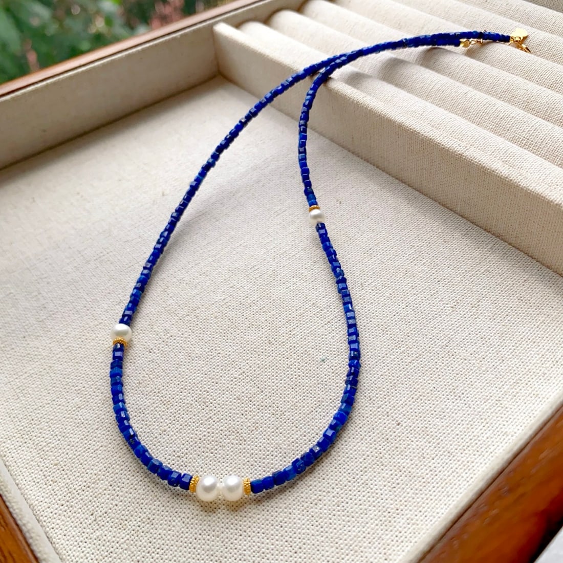 Natural Lapis Lazuli Necklace: Title: Natural Lapis Lazuli Necklace Description: This necklace features natural lapis lazuli as the main stone, paired with natural pearls, showcasing unique elegance and tranquility. The S925