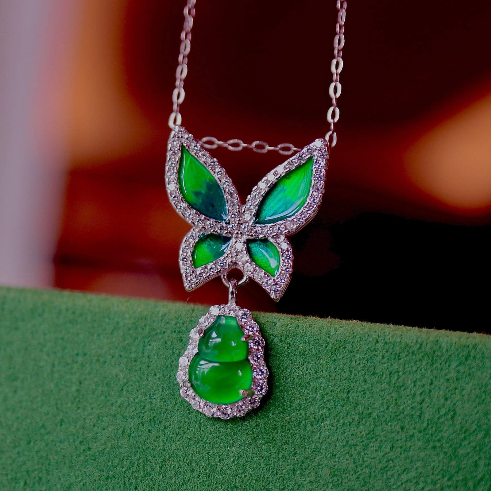 S925 Silver Natural Type Butterfly Pendant: Title: S925 Silver Natural Type Butterfly Pendant Description: This jadeite butterfly pendant showcases the natural beauty of jadeite with its vibrant green hue and simple yet elegant design. Set in S
