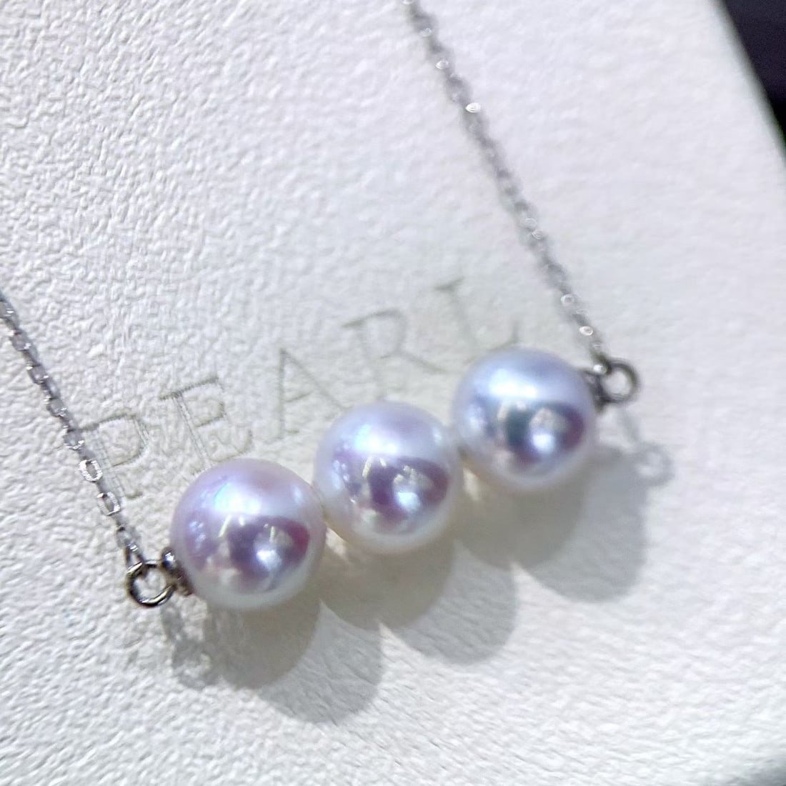 Sterling Silver Aurora Freshwater Pearl Necklace: Title: Sterling Silver Aurora Freshwater Pearl Necklace Description: This meticulously crafted sterling silver piece features 9-10mm round freshwater pearls, showcasing the natural luster and elegance
