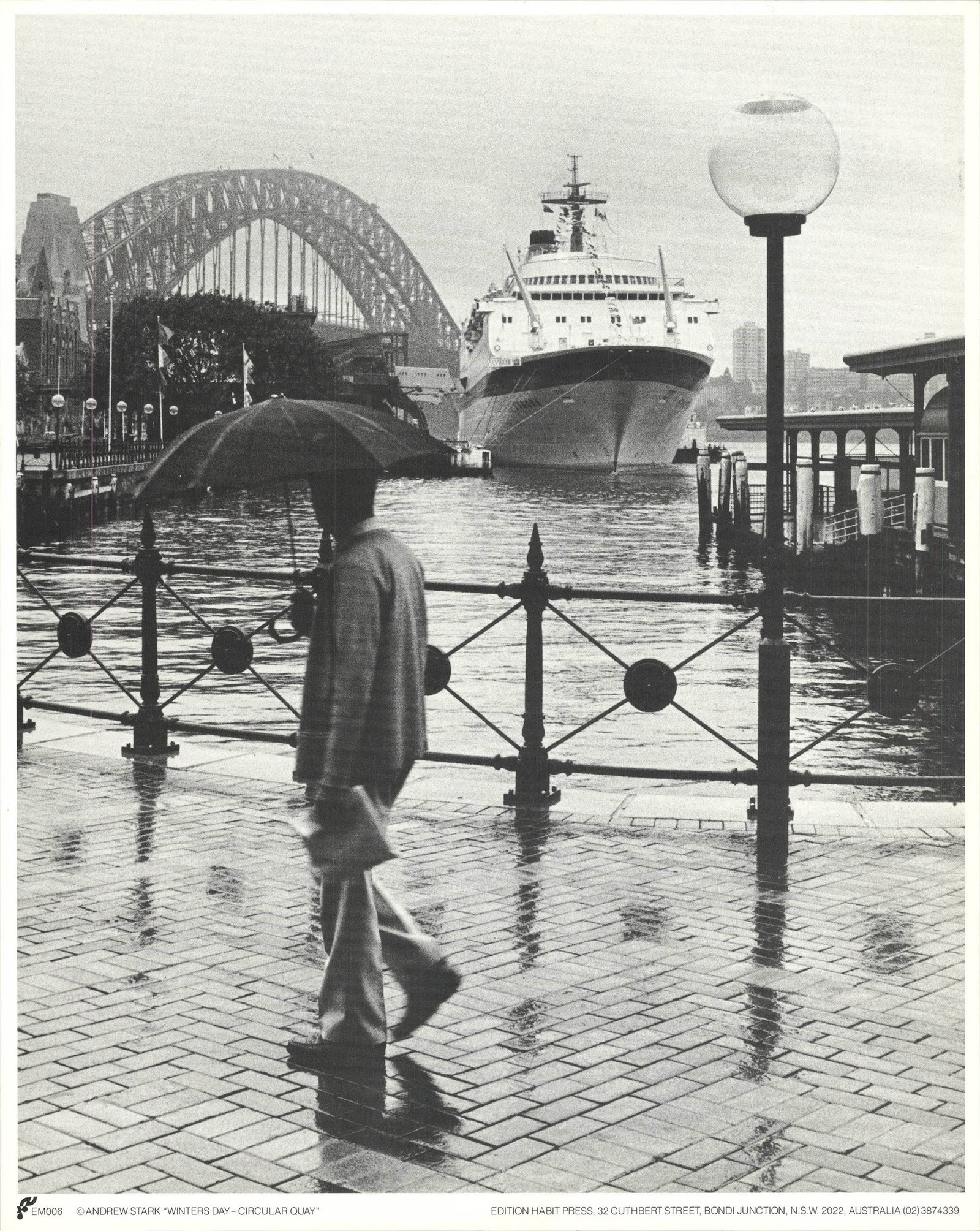 Circular Quay, Auckland: Circular Quay, Auckland by Andrew Stark, Unsigned Offset Lithograph. Paper size is 11.75 x 9.5 inches, with an image size of 11.75 x 9.5 inches. The Offset Lithograph is from an unknown edition size.