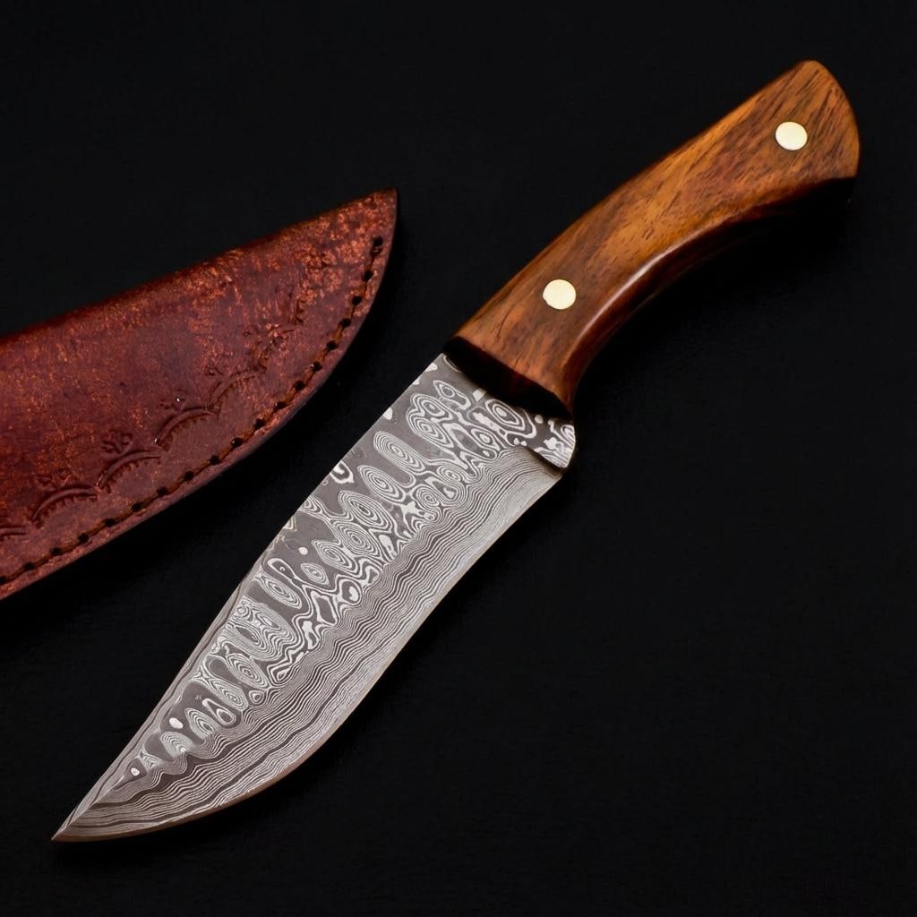 9" Damascus Steel Skinner Hunting Knife - Handmade, Rose Wood Handle, Leather Sheath: Title:9" Damascus Steel Skinner Hunting Knife - Handmade, Rose Wood Handle, Leather Sheath Description:This listing is for a custom handmade hunting and skinning knife, featuring a beautifully crafted