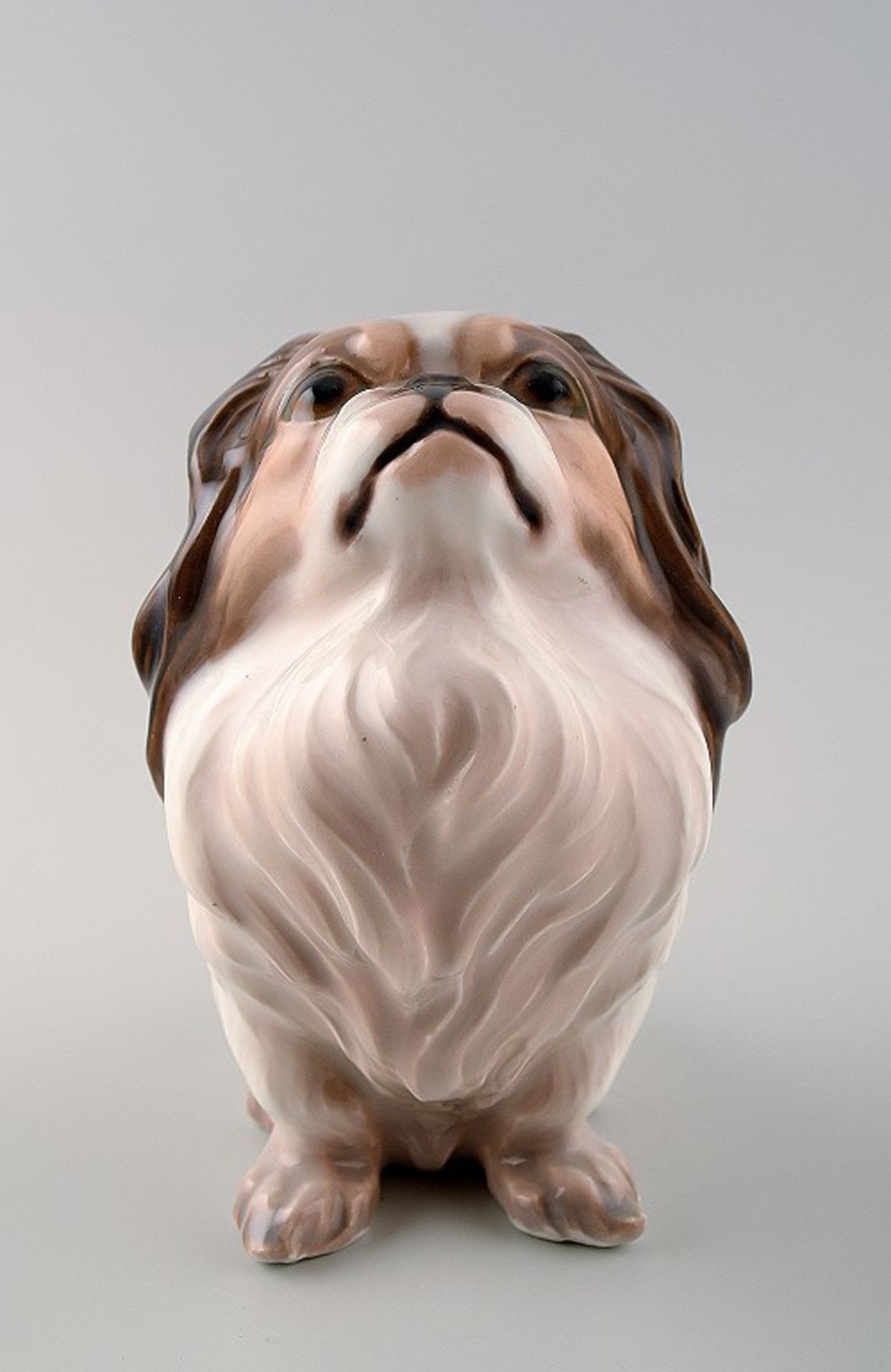Dahl Jensen figurine of Pekingese. Decoration number 1003.: Title: Dahl Jensen figurine of Pekingese. Decoration number 1003. Description: Dahl Jensen figurine of Pekingese. Decoration number 1003. 1st. factory quality. Measures 13 x 12 cm. Brand: Dahl Jensen