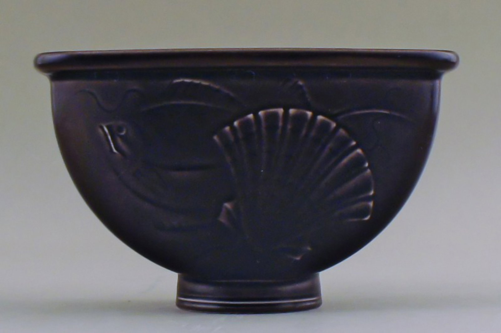 Aluminia flowerpot holder in earthenware, brown with fish and seashell motif. Number 1602.: Title: Aluminia flowerpot holder in earthenware, brown with fish and seashell motif. Number 1602. Description: Aluminia flowerpot holder in earthenware, brown with fish and seashell motif. Number