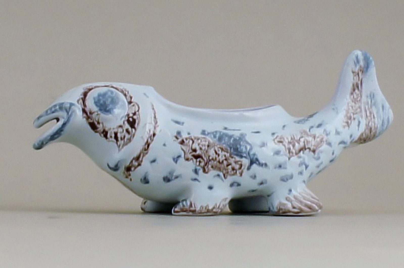Rare Aluminia fabulous animal.: Title: Rare Aluminia fabulous animal. Description: Rare Aluminia fabulous animal. Unique, signed "TO". 19 cm. tall. In perfect condition. Brand: Aluminia Reserve: $259.00 Shipping: Domestic: Shipping