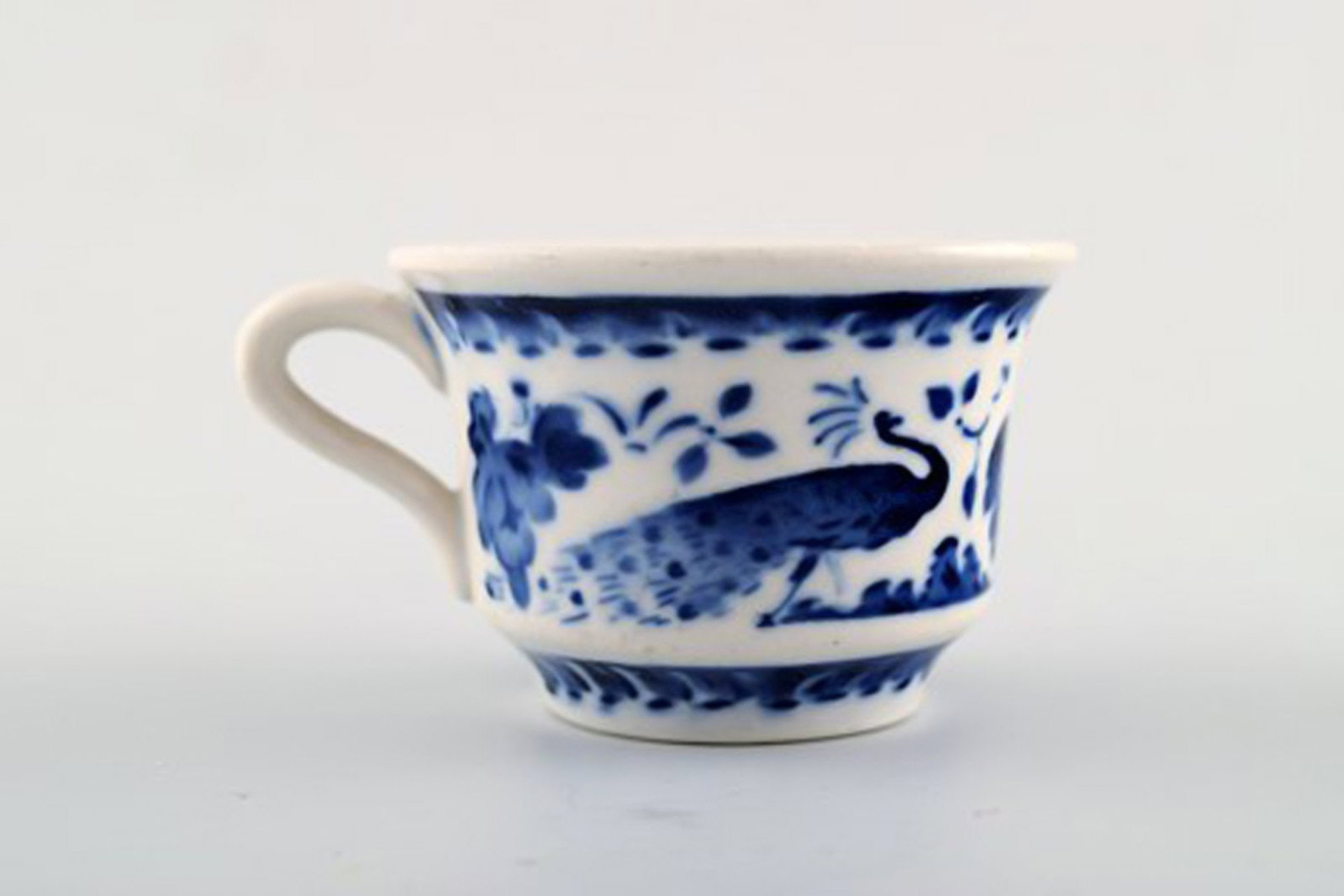 Peacock from Copenhagen faience / Aluminia. Coffee / mocha cup with saucer in faience. - 2
