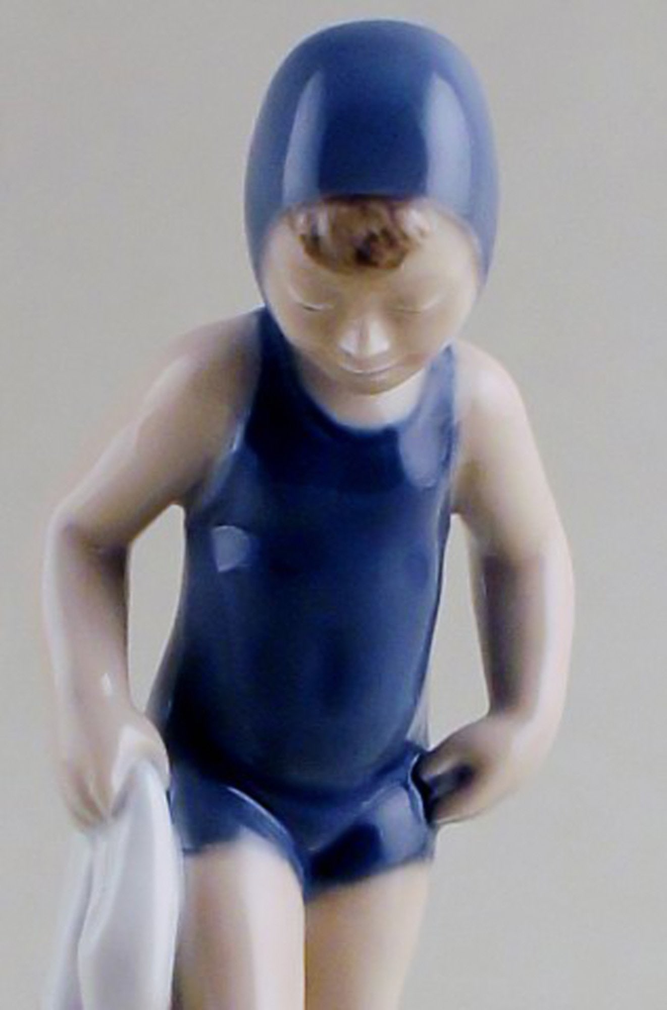 Royal Copenhagen number 4529, July - girl bathing. - 2