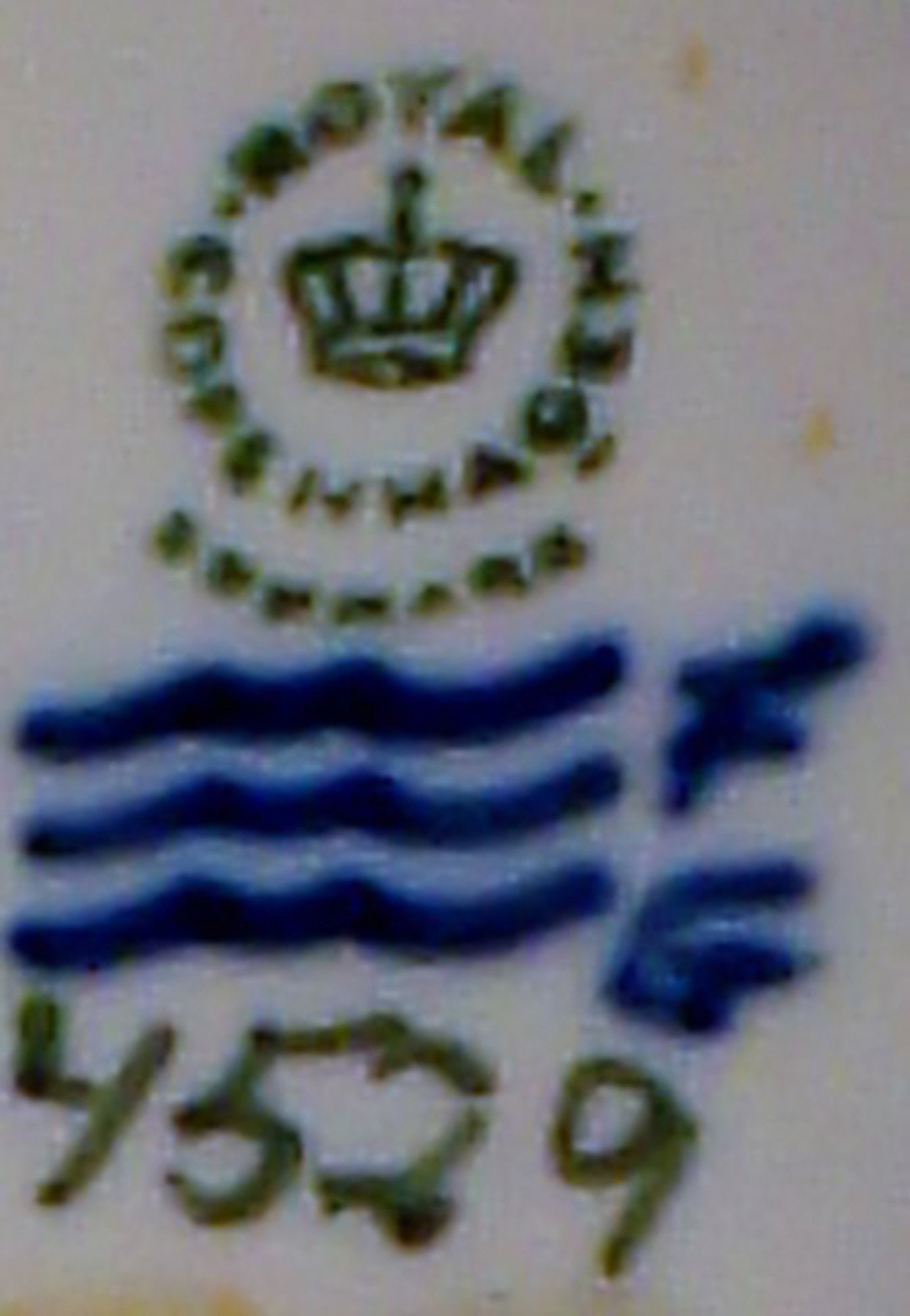 Royal Copenhagen number 4529, July - girl bathing. - 4