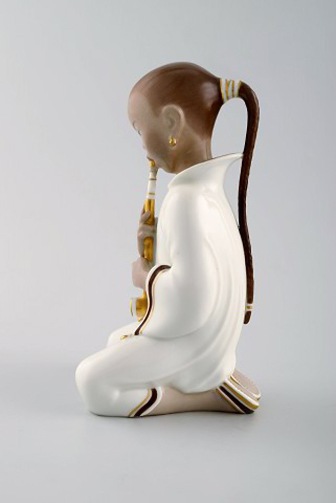Arno Malinowski for Royal Copenhagen, number 2342 Opium Smoking girl. Porcelain figurine in - 2