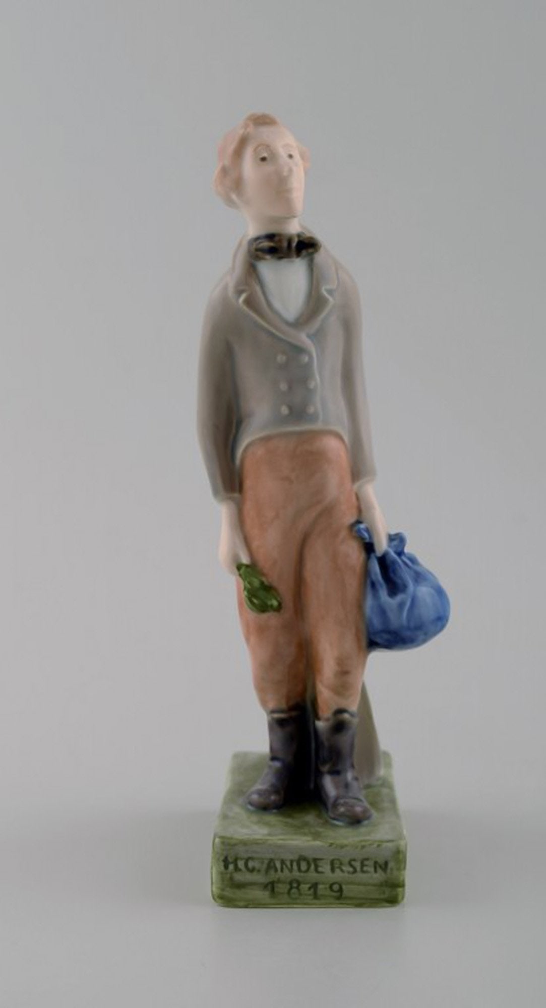 Royal Copenhagen Figure H.C. Andersen # 5245.: Title: Royal Copenhagen Figure H.C. Andersen # 5245. Description: Royal Copenhagen Figure H.C. Andersen # 5245. Measures 19 cm. In perfect condition. Designed by Hanne Warming. 2. factory quality. Bra
