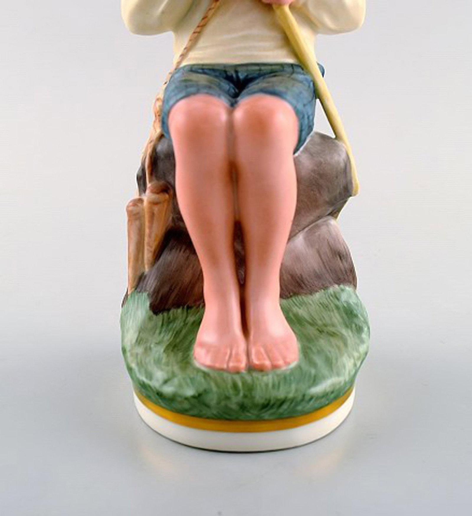 Royal Copenhagen porcelain figurine in high quality over glaze. Young boy. Model number 905. Dated - 5