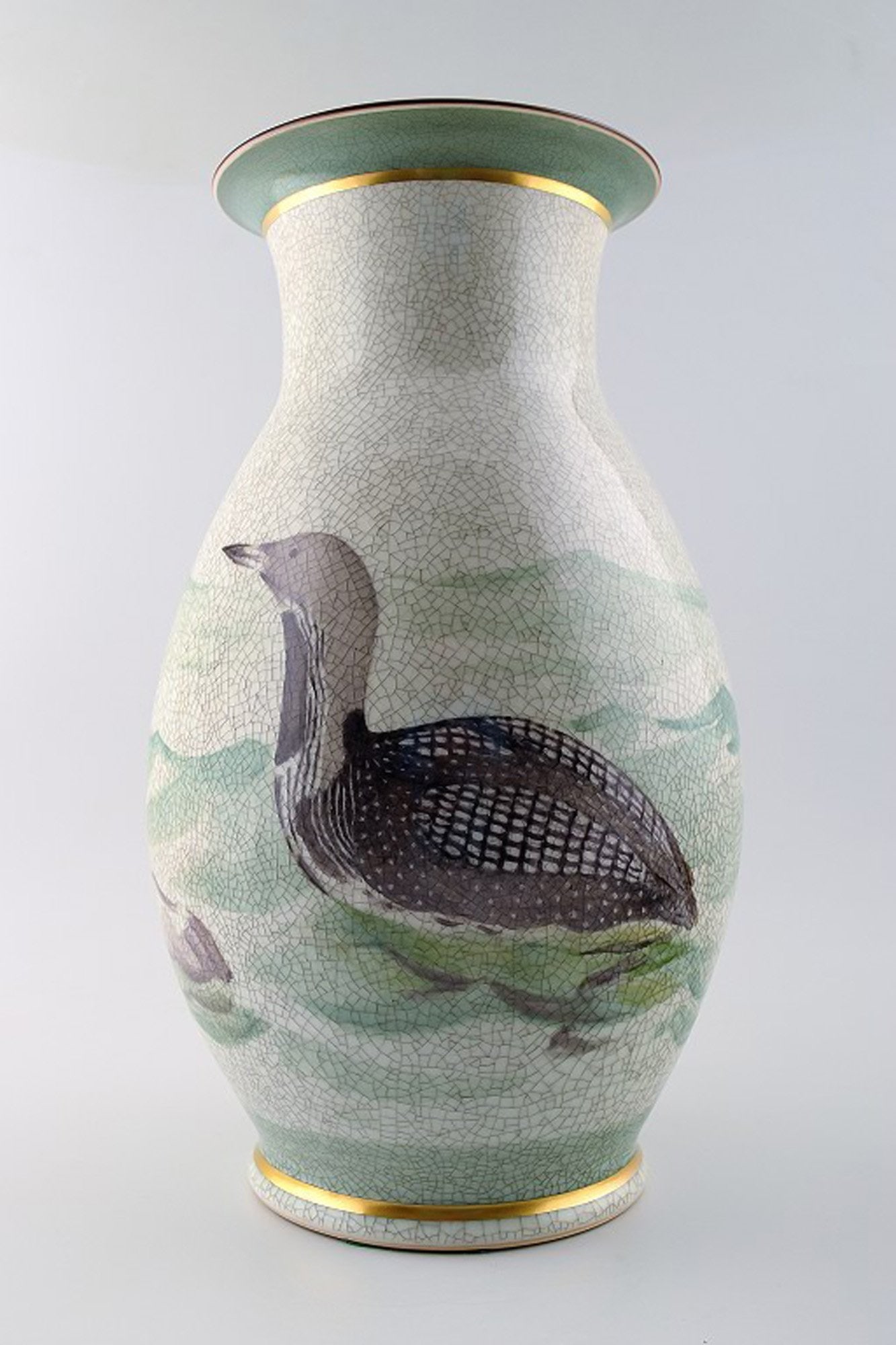 Royal Copenhagen large unique vase decorated with a diver, hand painted.: Title: Royal Copenhagen large unique vase decorated with a diver, hand painted. Description: Royal Copenhagen large unique vase decorated with a diver, hand painted. Signed "TN 43". Measuring 36.5 x 1