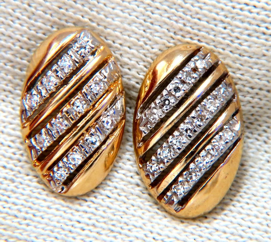 .20ct natural round diamonds oval striped earrings 14kt**: Title: .20ct natural round diamonds oval striped earrings 14kt** Description: Oval Striped .20ct. Natural diamonds Rounds, Full cut brilliants. H- color Vs-2 Clarity. Excellent detail. 14kt. yellow