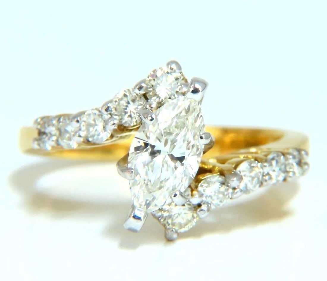 GIA Certified .77ct Marquise Shape natural diamond ring 14 Karat *v: Title: GIA Certified .77ct Marquise Shape natural diamond ring 14 Karat *v Description: Revisit Cross-Over Solitaire + Accent GIA Certified Diamond engagement ring. .77ct. Natural marquise diamond GIA