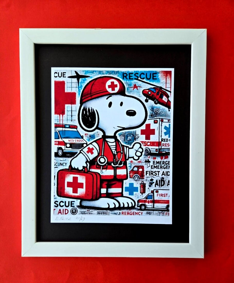 AIDAN FLUX | Hand Signed Authentic Print Framed SNOOPY WORKS AT RED CROSS COA: This is a one-of-a-kind Hand Signed Authentic Giclee by AIDAN FLUX. From his Series "American Icons" The print is 10x8in., measuring framed 16 inches in height and 12 inches in width, it comes framed 