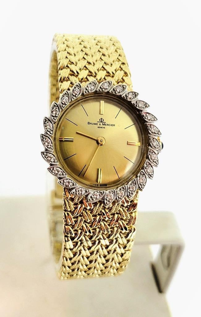 Vintage 14k Gold BAUME & MERCIER Ladies Winding Watch with Diamond Bezel 916120: Vintage 14k Gold BAUME & MERCIER Ladies Winding Watch with Diamond Bezel 916120 This Ladies BAUME & MERCIER watch is Swiss made Great present for watch collectors & enthusiasts! * 14k yellow gold case