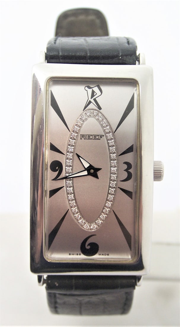 Mens Solid & Heavy Platinum Swiss REEF Watch with Diamond dial* 45 mm Long* EXLNT: Mens Solid & Heavy Platinum Swiss REEF Watch with Diamond dial* Excellent Condition 45 mm Long * REEF Series Mens watch Collection with Diamonds is Swiss made * Case, back & buckle are Platinum *