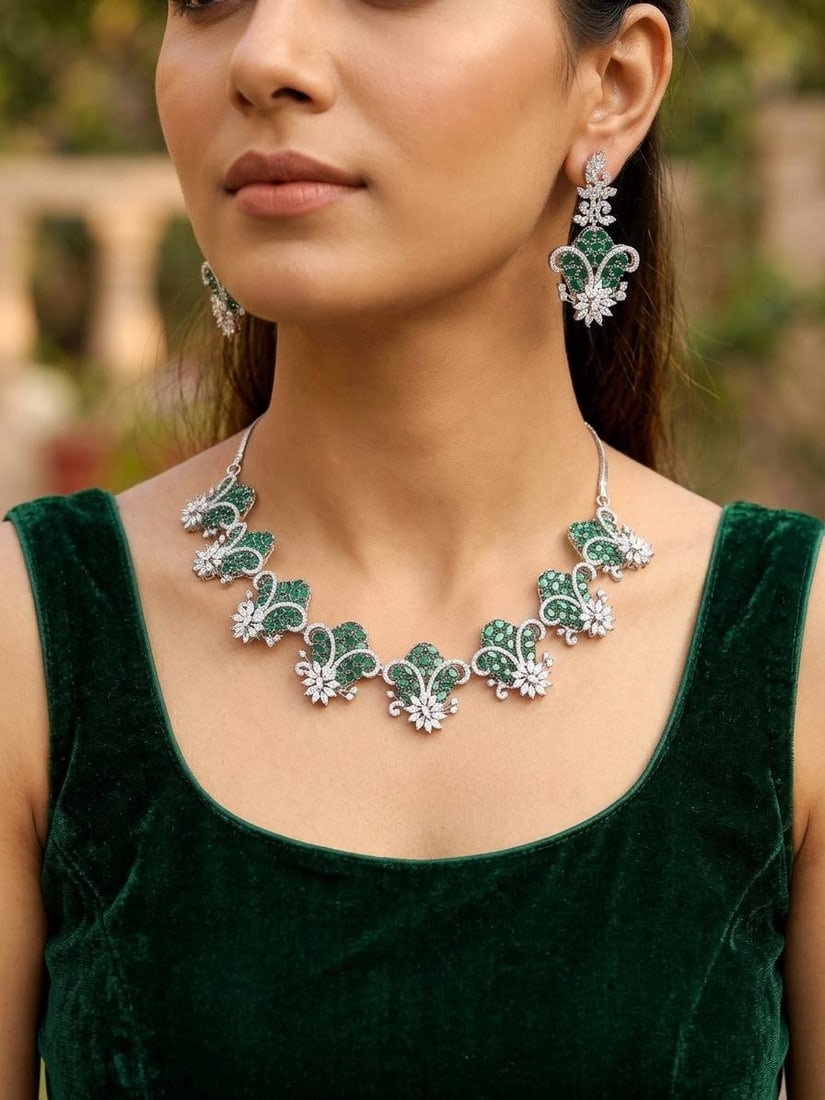 Green Stone Studded Floral Design American Diamond Necklace Set: Title:Green Stone Studded Floral Design American Diamond Necklace Set Reference:itemcode : JA0679 Reserve: $146.00 Shipping: Domestic: Shipping rates are determined by destination International: