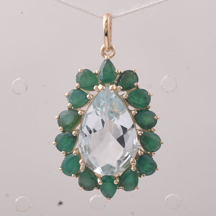 4.52 Ct Pear Aquamarine 9K Gold Pendant: 4.52 Total Carat Aquamarine 9K Gold Pendant Specifications: Total Weight 2.126 g Center Gemstone Aquamarine Gemstone Carat Weight 2.59 Carats Gemstone Measurements 13.70X9X4.30 mm Additional