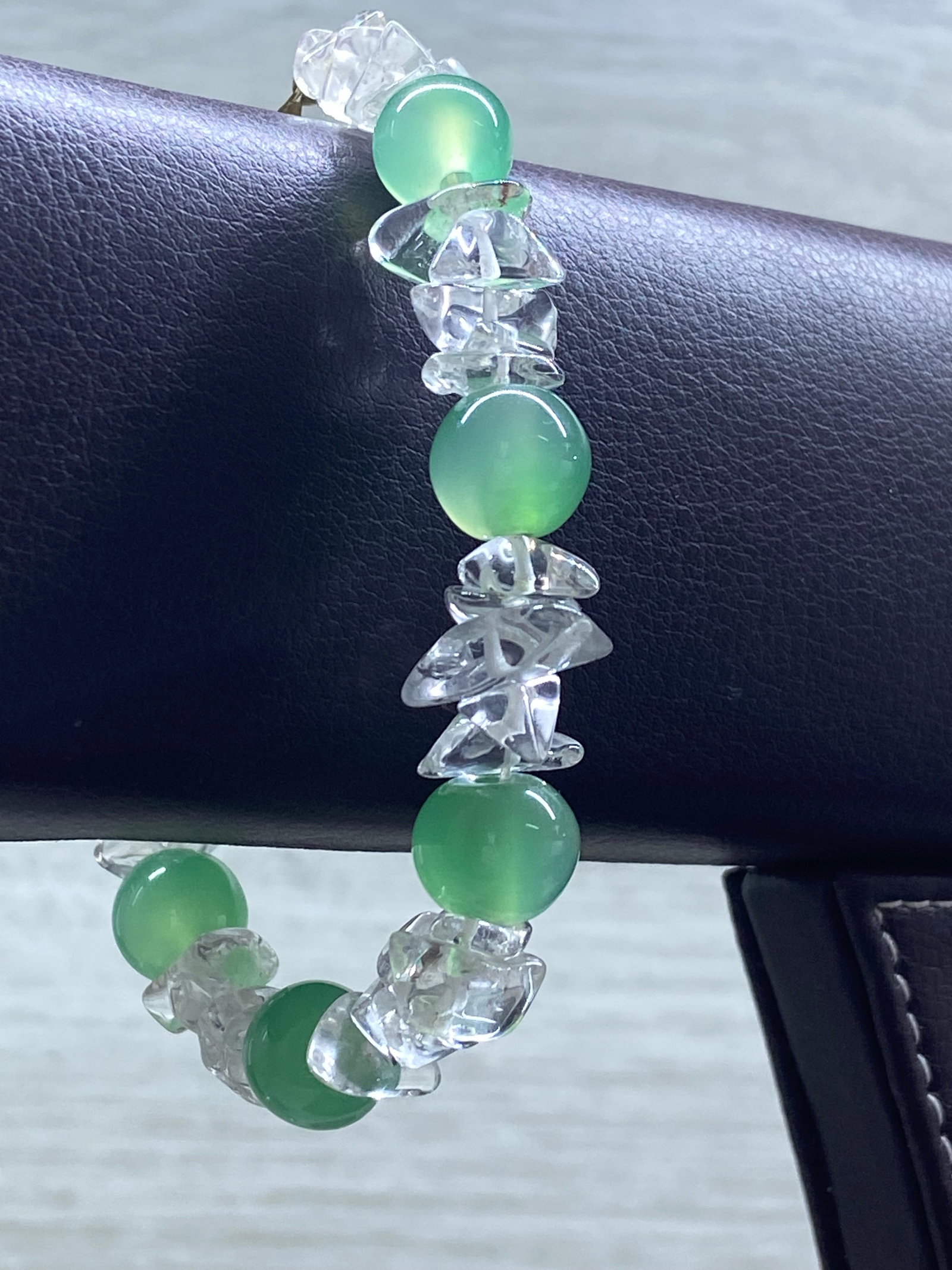 Vintage Green Chalcedony and Rock Crystal Bead Bracelet: Title:Vintage Green Chalcedony and Rock Crystal Bead Bracelet Description:This elegant vintage bracelet features a beautiful combination of round green chalcedony beads interspaced with irregularly
