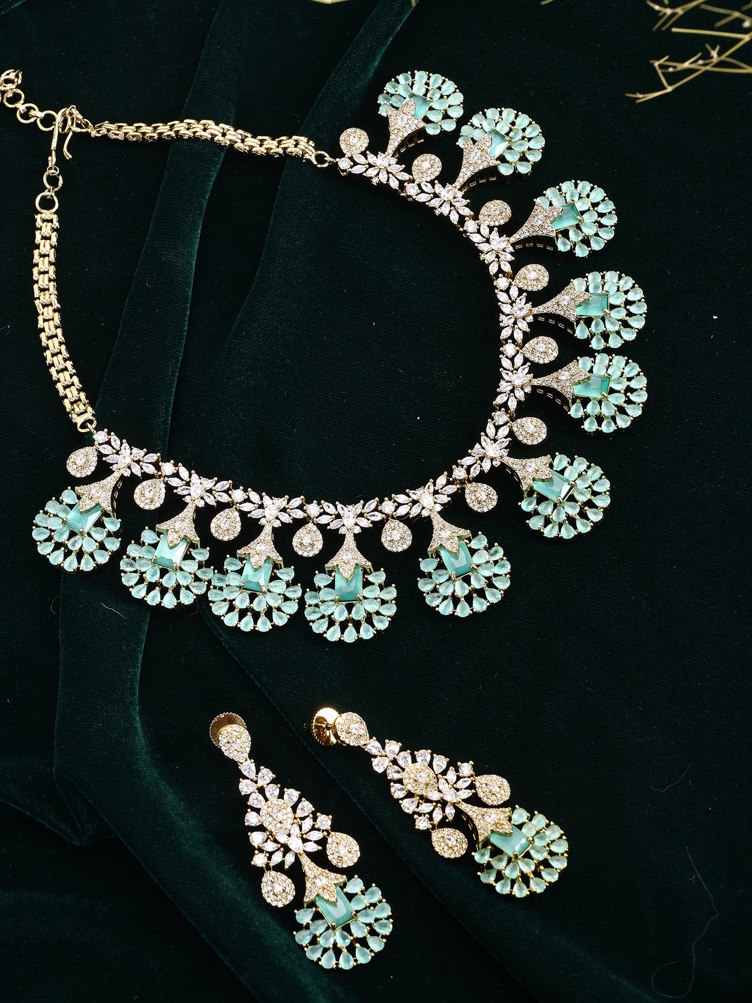 Stone Studded American Diamond Floral Statement Necklace Set with Earrings: Title:Stone Studded American Diamond Floral Statement Necklace Set with Earrings Reference:itemcode : JA0675-Sea Green Reserve: $189.00 Shipping: Domestic: Shipping rates are determined by
