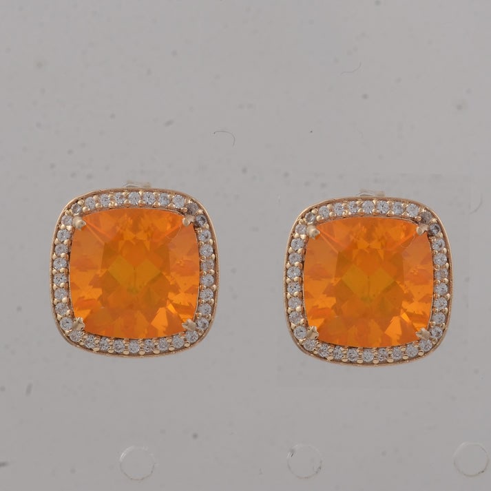 4.21 Ct Cushion B.R Fire Opal 9K Gold Earrings: 4.21 Total Carat B.R Fire Opal 9K Gold Earrings Specifications: Total Weight 2.812 g Center Gemstone B.R Fire Opal Gemstone Carat Weight 3.96 Carats Gemstone Measurements 9X9X6.20 inch Additional Gems