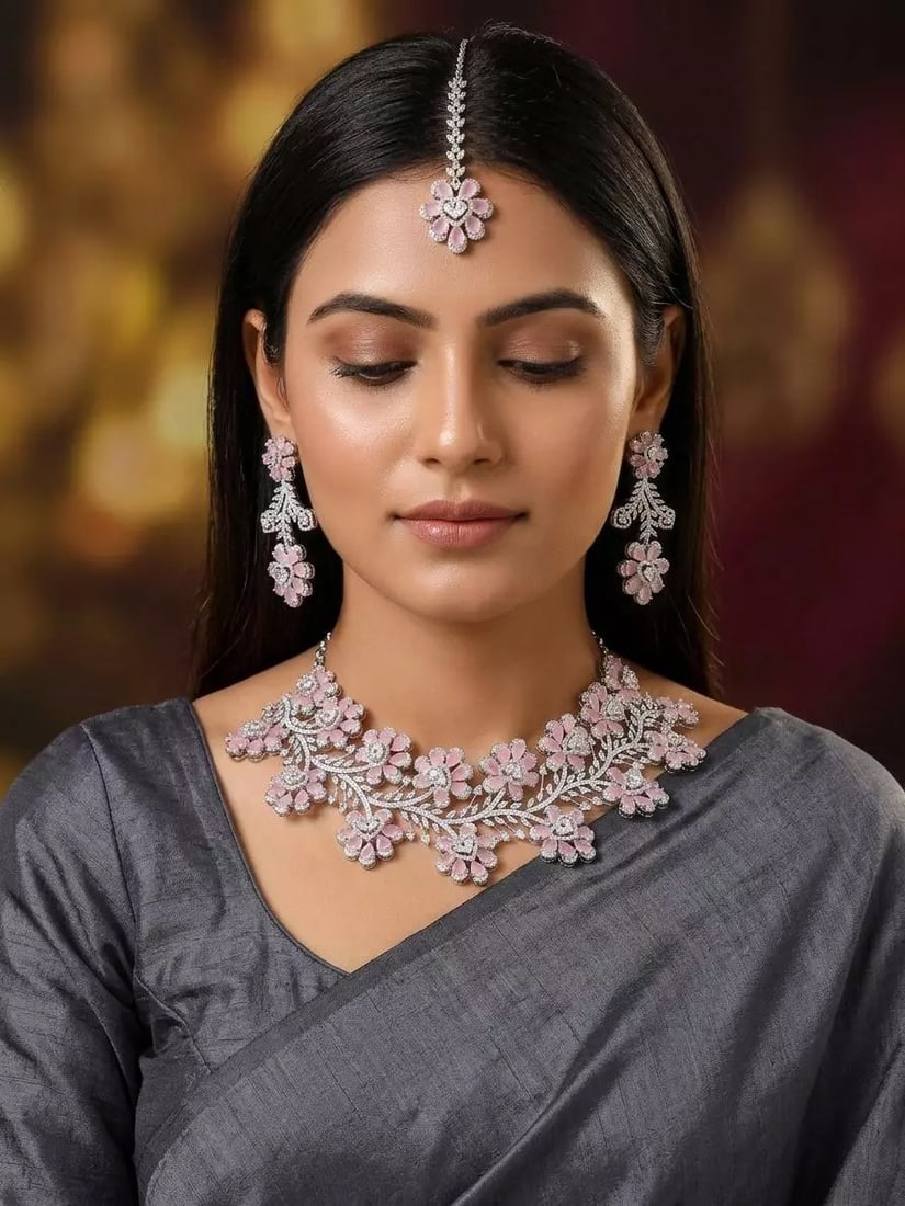 Pink Floral Design Stone Studded American Diamond Necklace Set with Maang Tikka: Title:Pink Floral Design Stone Studded American Diamond Necklace Set with Maang Tikka Reference:itemcode : JA0667 Reserve: $275.00 Shipping: Domestic: Shipping rates are determined by destination