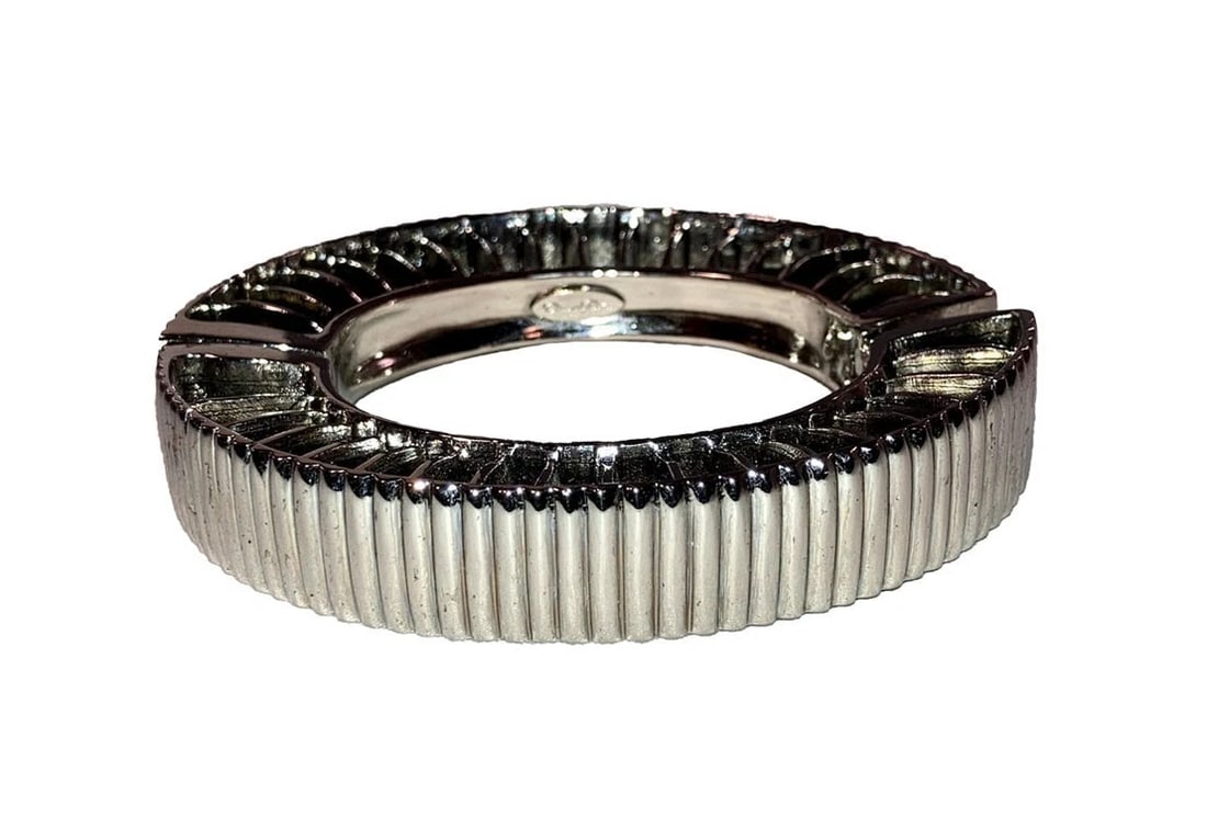 Oscar de La Renta Geometric Futuristic Cut Out Silvertone Bangle Bracelet ODLR: Title:Oscar de La Renta Geometric Futuristic Cut Out Silvertone Bangle Bracelet ODLR Description:Oscar de La Renta Geometric Futuristic Cut Out Silvertone Bangle Bracelet ODLR. Circa 1990's. Measures 