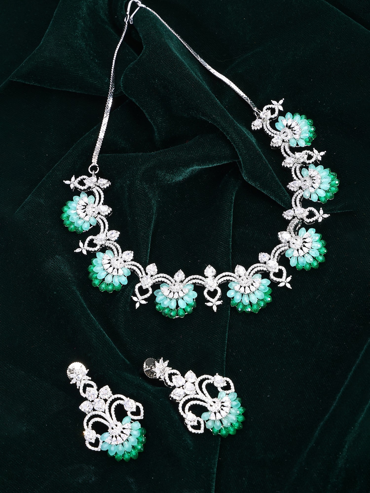 Floral Design American Diamond Stone Studded Necklace Set: Title:Floral Design American Diamond Stone Studded Necklace Set Reference:itemcode : JA0681-Sea Green Reserve: $140.00 Shipping: Domestic: Shipping rates are determined by destination International: