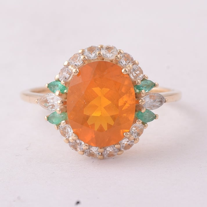 2.50 Ct Oval Fire Opal 9K Gold Ring: 2.50 Total Carat Fire Opal 9K Gold Ring Specifications: Total Weight 2.312 g Center Gemstone Fire Opal Gemstone Carat Weight 1.6 Carats Gemstone Measurements 10X8X5.10 mm Additional Gemstones White