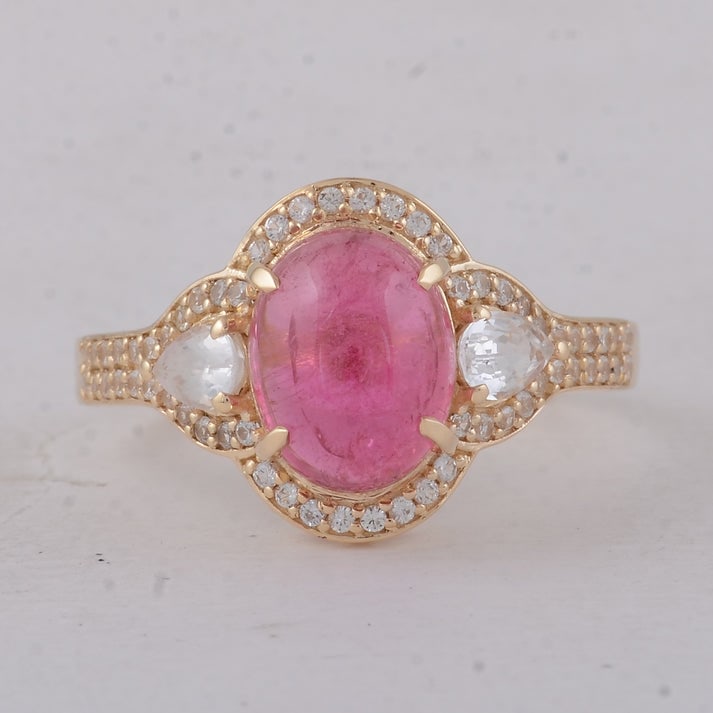 3.21 Ct Oval Tourmaline 9K Gold Ring: 3.21 Total Carat Tourmaline 9K Gold Ring Specifications: Total Weight 2.65 g Center Gemstone Tourmaline Gemstone Carat Weight 2.61 Carats Gemstone Measurements 9X7 mm Additional Gemstones White Sapphi