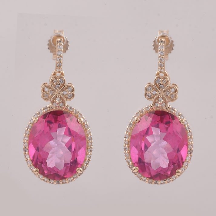 12.82 Ct Oval Pink Topaz 9K Gold Earrings: 12.82 Total Carat Pink Topaz 9K Gold Earrings Specifications: Total Weight 5.192 g Center Gemstone Pink Topaz Gemstone Carat Weight 12.4 Carats Gemstone Measurements 12X10 mm Additional Gemstones Whit