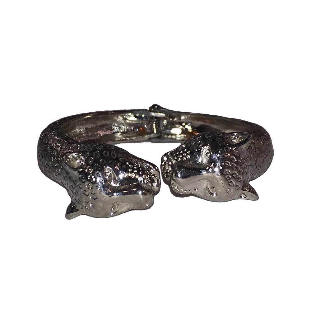 Silver Tone Cougar Animal Clamper Bracelet: Title:Silver Tone Cougar Animal Clamper Bracelet Description:Silver Tone Cougar Animal Clamper Bracelet, great design with tons of detail. Face of the bracelet measures 2" by 3/4" wide. Bracelet measu