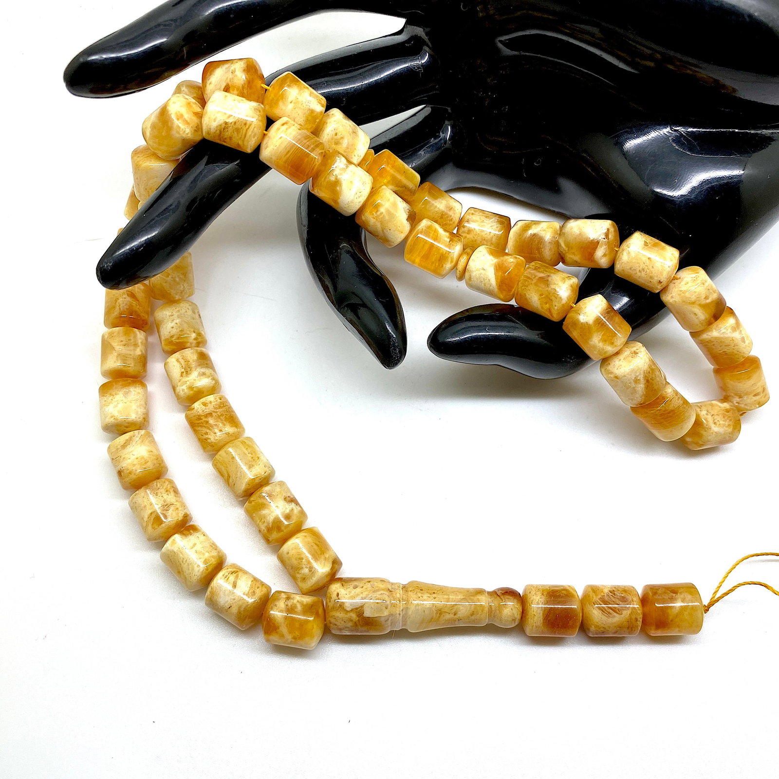 Remarkable Unique Antique Amber Tesbih made from Barrel shaped Amber beads: Title: Remarkable Unique Antique Amber Tesbih made from Barrel shaped Amber beads Metal: None Gemstone: Amber Weight: 30.9 g Size: Bead size: 11.0 x 9.0 mm Bead size: 0.433 x 0.354 inches Made of: (Re