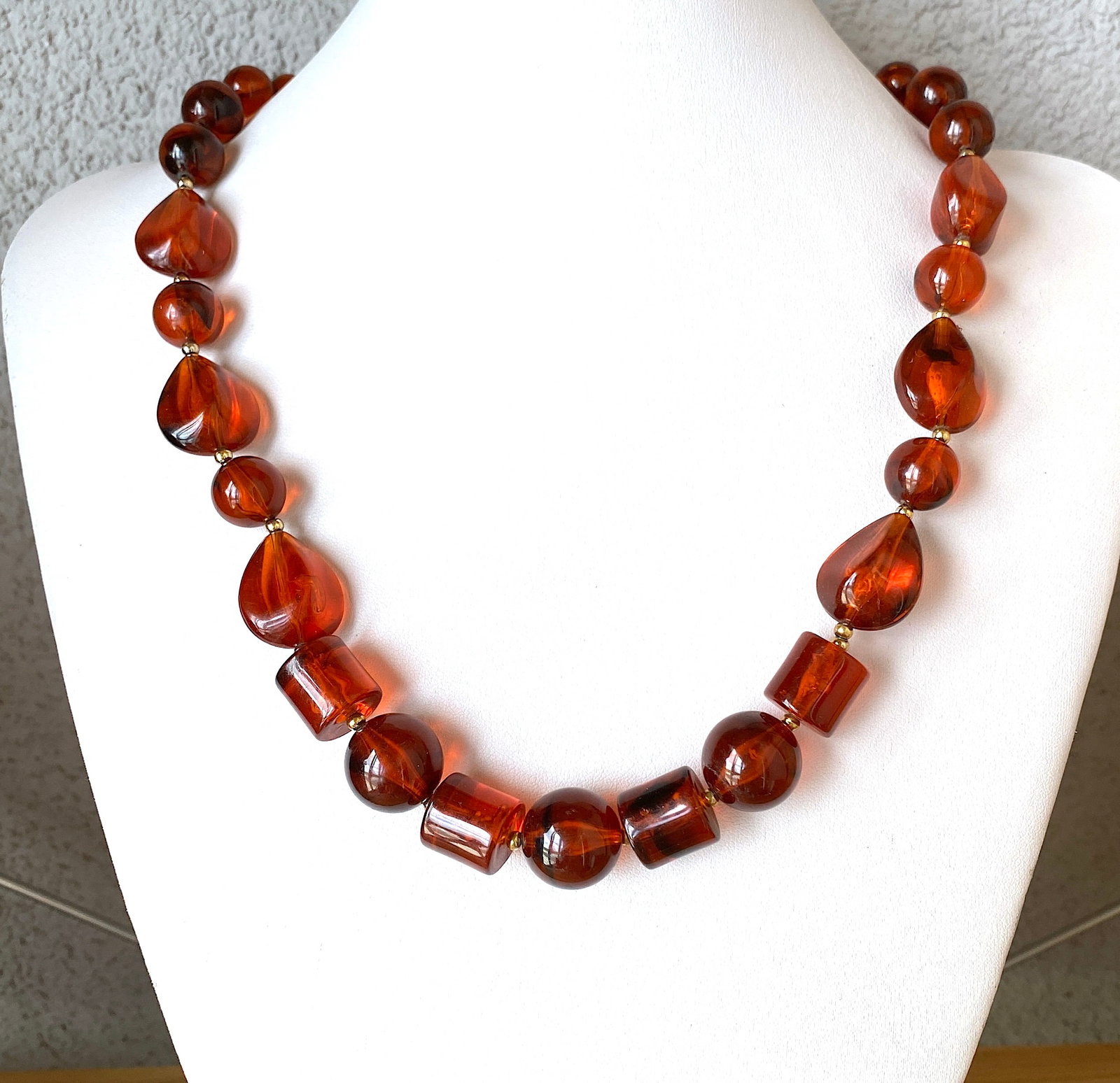 Alluring Amber Necklace: Title: Alluring Amber Necklace Metal: None Gemstone: Amber Weight: 60.88 g Size: Size: 600.0 x 17.0 x 17.0 mm Size: 23.622 x 0.669 x 0.669 inches Made of: (Reconstituted Amber or Whole Stone):