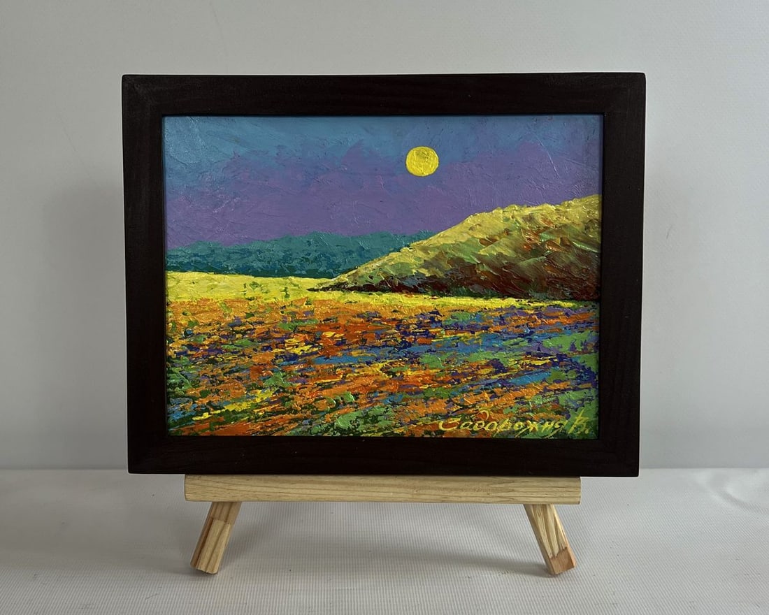 Oil painting Pink sunset in the field V. Zadorozhnya: No.AAA4593The painting "Pink Sunset in the Field" captures the serene beauty of a landscape bathed in the last warm glow of the setting sun. Using rich oil paints on cardboard, the artist brings to li