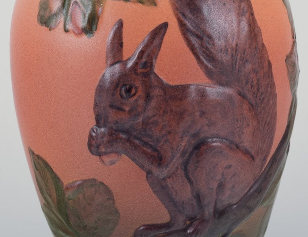 Ipsens Enke, Denmark. Ceramic vase with squirrel. Glazing in orange and green tones. 1920s/30s. - 4