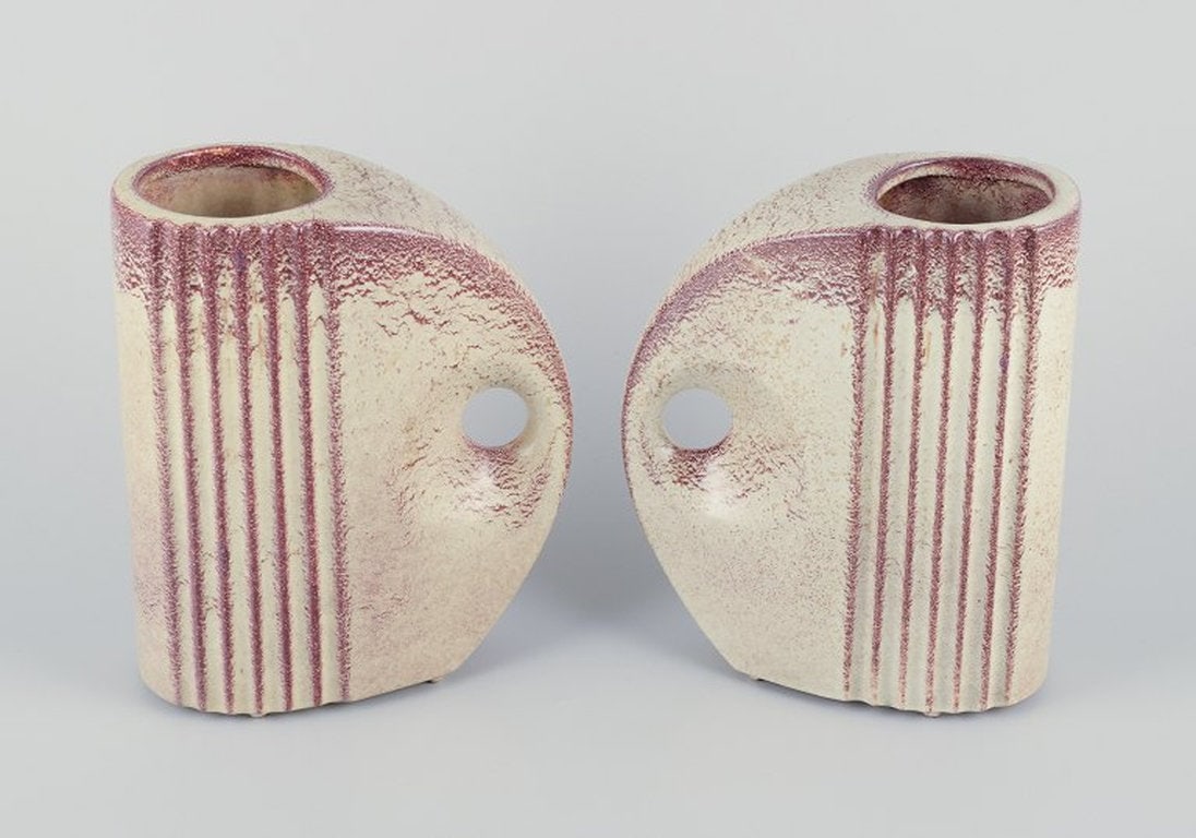 French ceramicist. A pair of Art Deco jug-shaped vases with handles. Mid 20th century.: French ceramicist. A pair of Art Deco jug-shaped vases with handles. Glaze in sand-coloured and brown tones. Mid 20th century. Unmarked. Perfect condition. Dimensions: H 22,5 cm. x W 17.5 cm.; French 