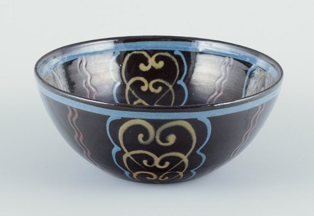 Kahler, Denmark. Ceramic bowl. Polychrome glaze on a black base. Circa 1930s. (1 of 6)